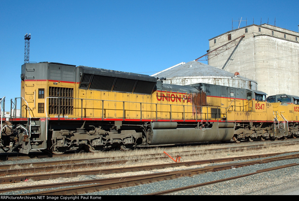 EMLX 8547, EMD SD90MAC-H, in storage on the KCS